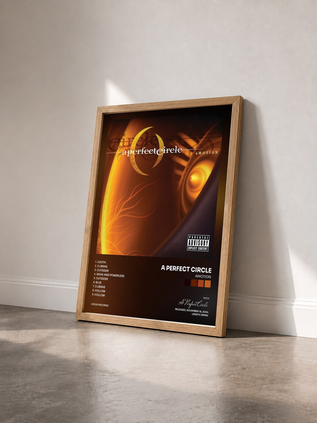 #bois Tableau de l'album aMOTION de A Perfect Circle vu de trois quarts, cadre en bois brut
