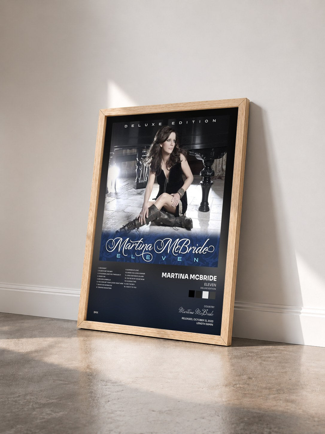 #bois Tableau de l'album Eleven (Deluxe Edition) de Martina McBride vu de trois quarts, cadre en bois brut