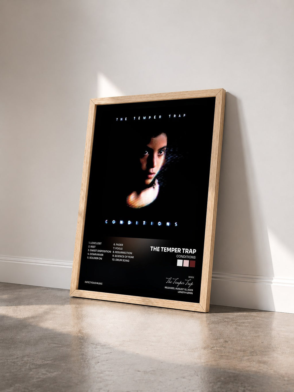 #bois Tableau de l'album Conditions de The Temper Trap vu de trois quarts, cadre en bois brut
