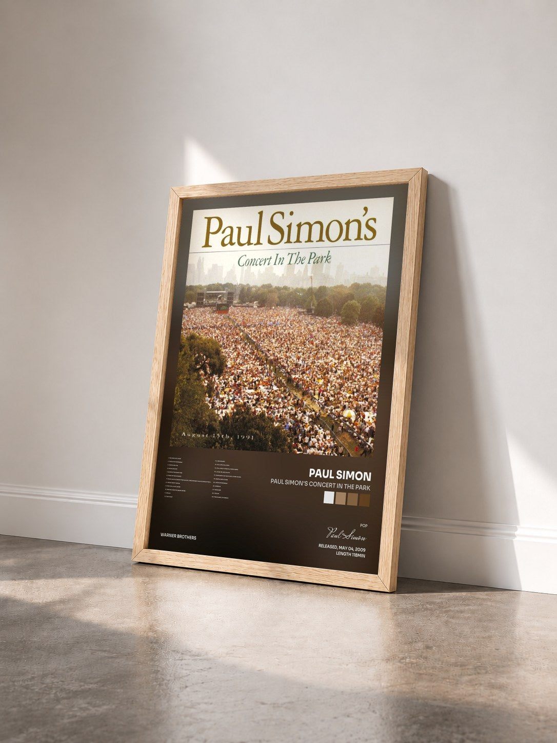 #bois Tableau de l'album Paul Simon's Concert In The Park de Paul Simon vu de trois quarts, cadre en bois brut
