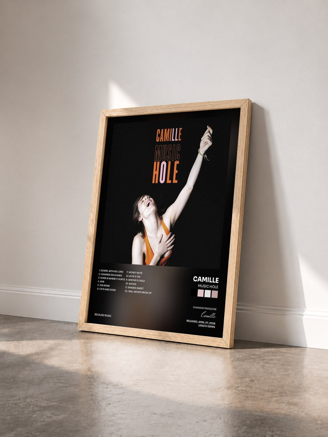 #bois Tableau de l'album Music Hole de Camille vu de trois quarts, cadre en bois brut