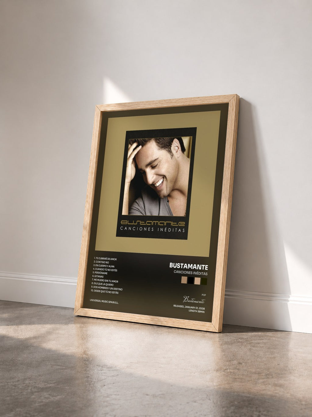 #bois Tableau de l'album Canciones Inéditas de Bustamante vu de trois quarts, cadre en bois brut