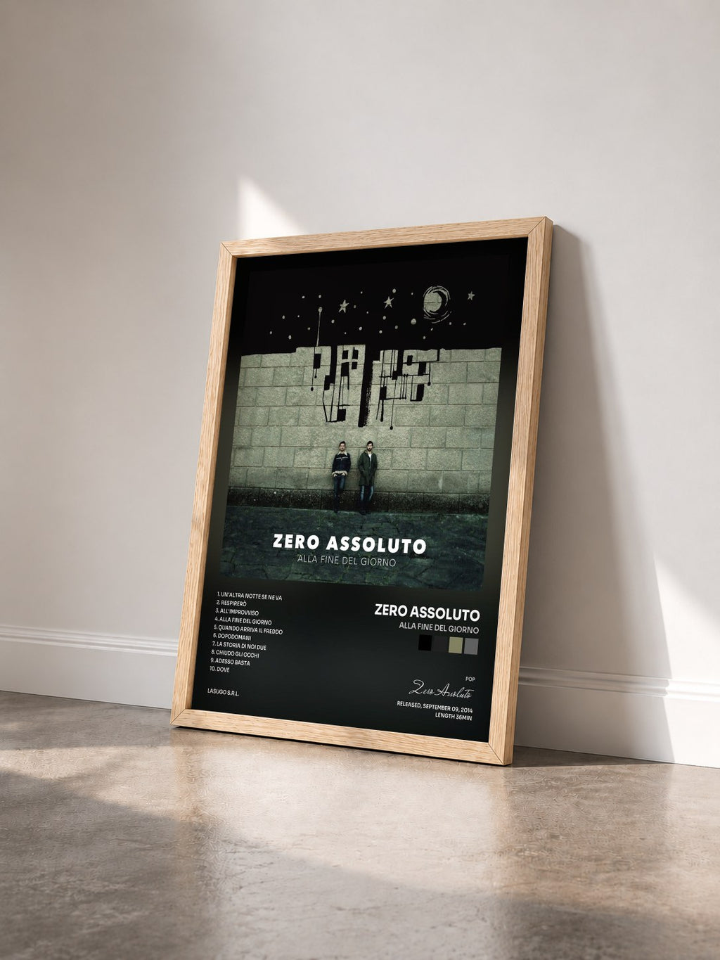 #bois Tableau de l'album Alla Fine Del Giorno de Zero Assoluto vu de trois quarts, cadre en bois brut
