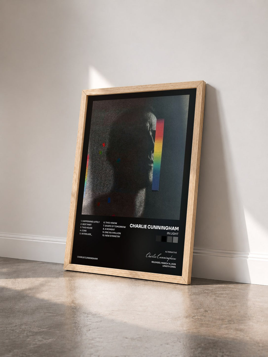 #bois Tableau de l'album In Light de Charlie Cunningham vu de trois quarts, cadre en bois brut