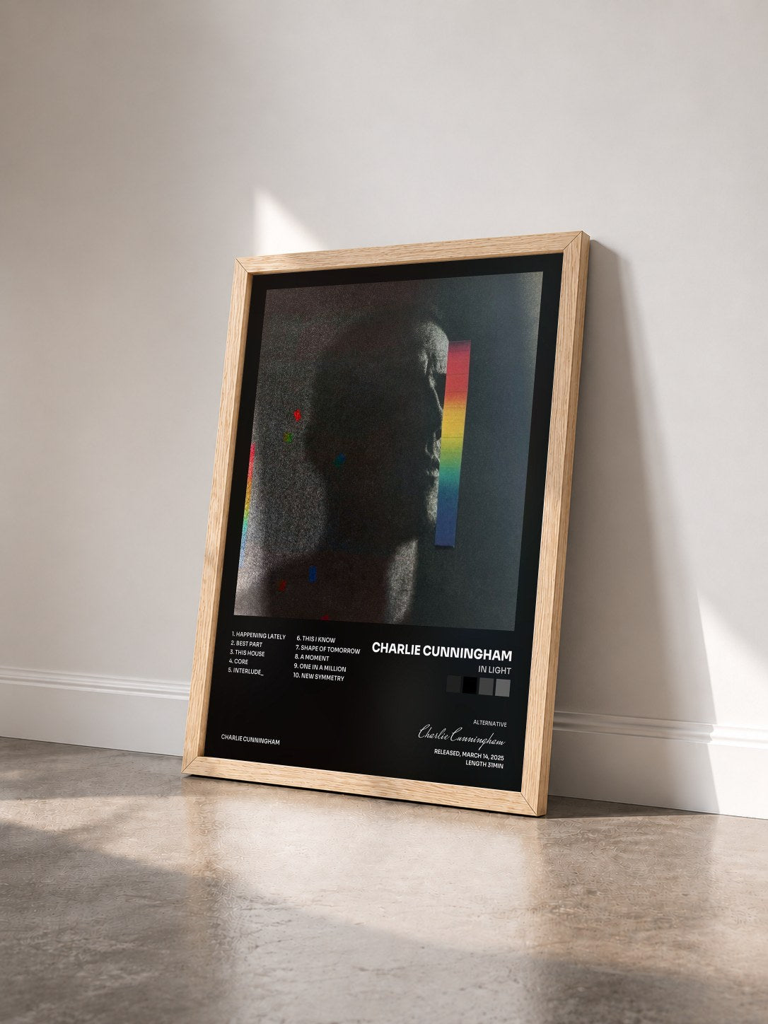 #bois Tableau de l'album In Light de Charlie Cunningham vu de trois quarts, cadre en bois brut