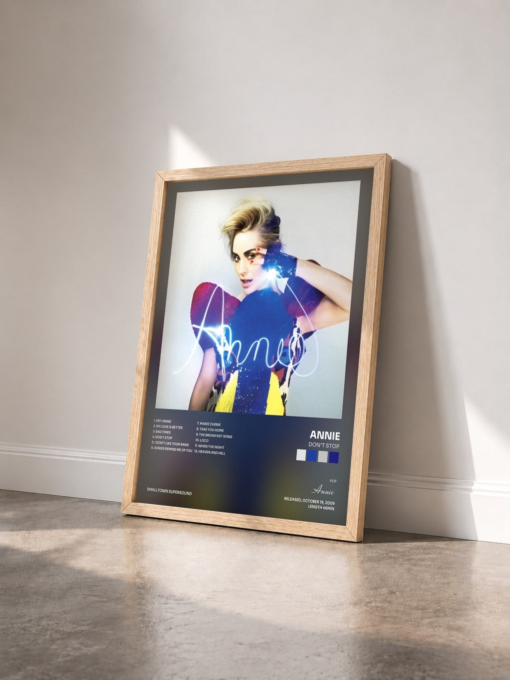 #bois Tableau de l'album Don't Stop de Annie vu de trois quarts, cadre en bois brut