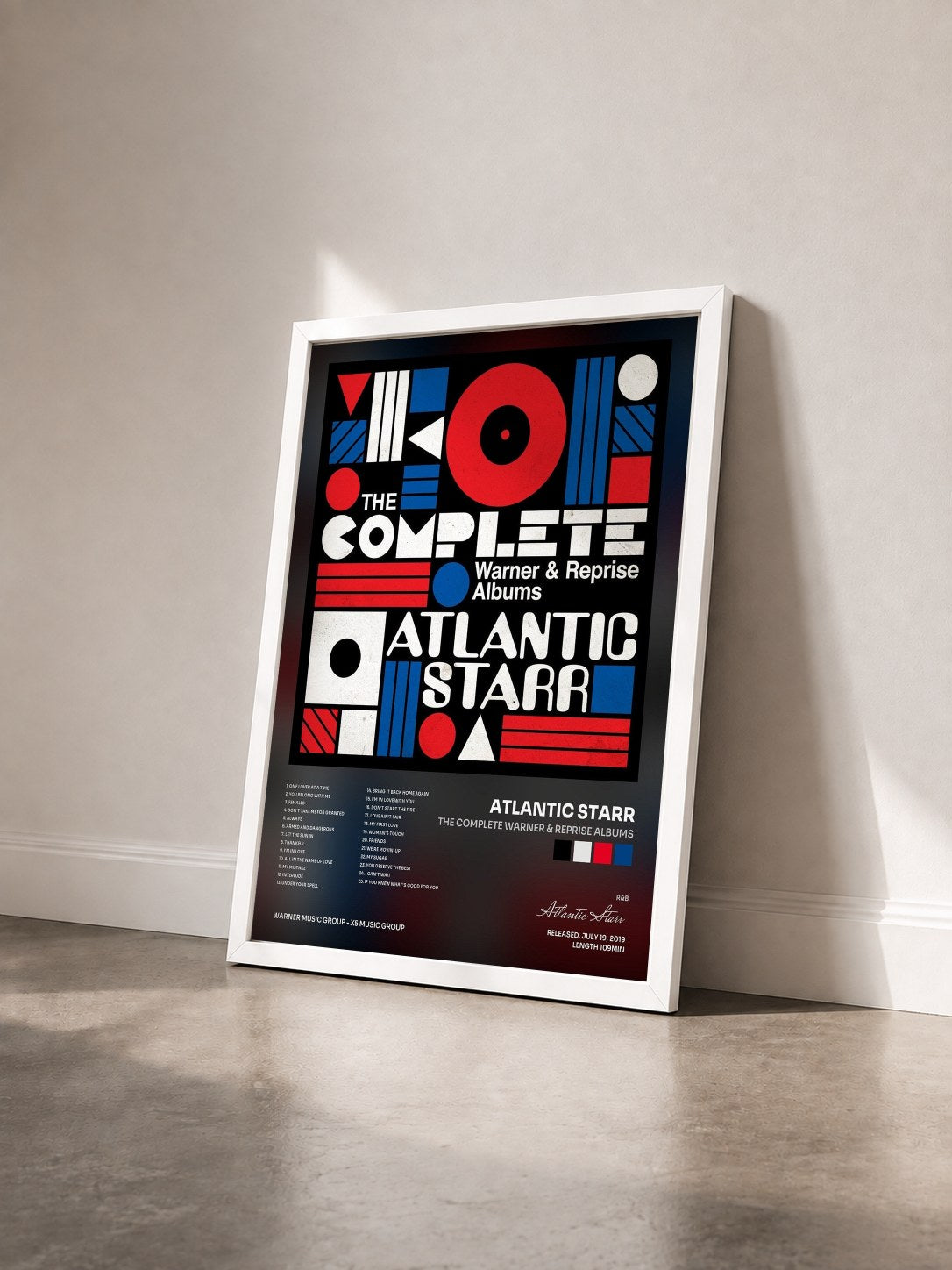 #blanc Tableau de l'album The Complete Warner & Reprise Albums de Atlantic Starr vu de trois quarts, cadre blanc