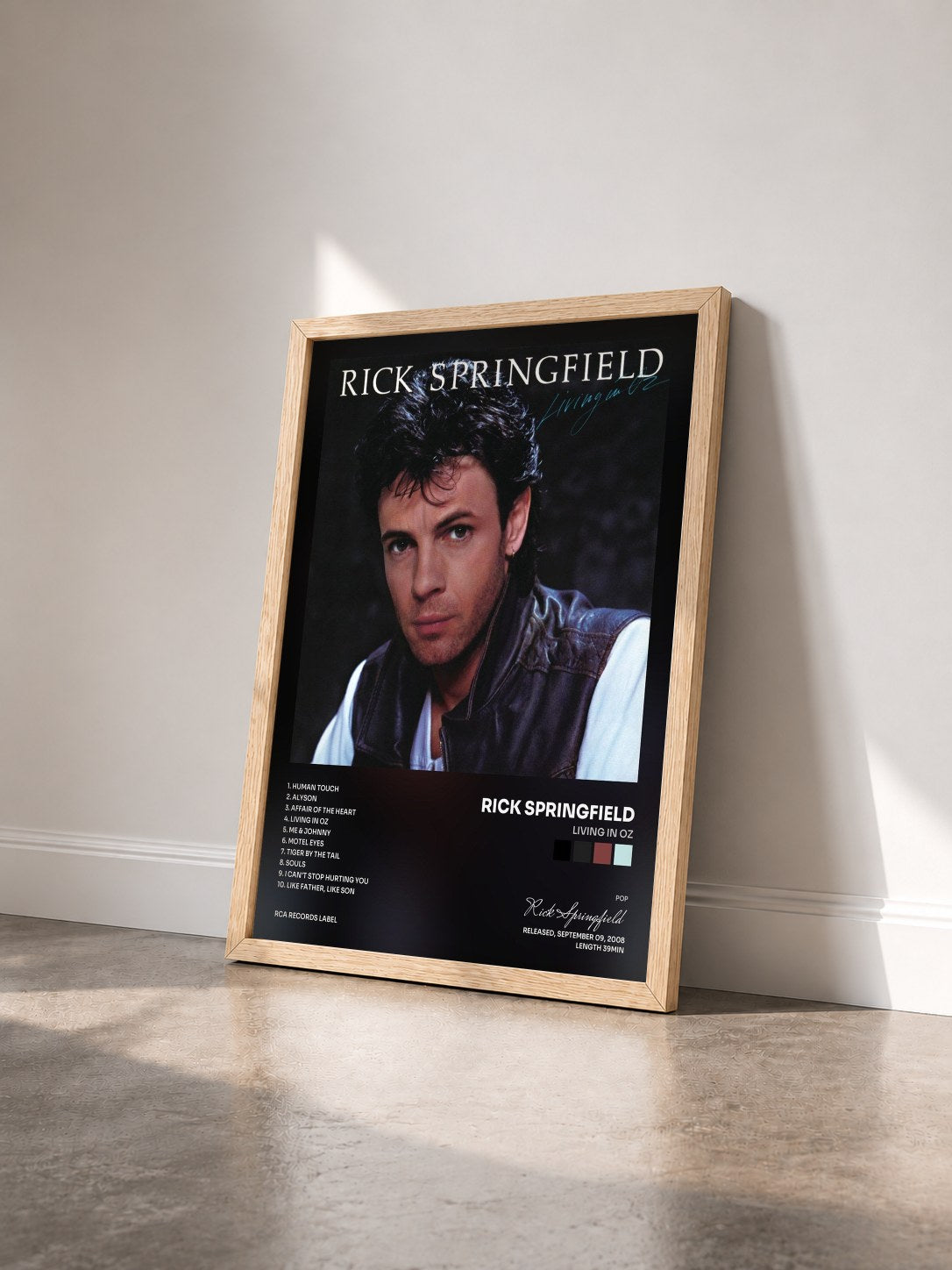 #bois Tableau de l'album Living In Oz de Rick Springfield vu de trois quarts, cadre en bois brut