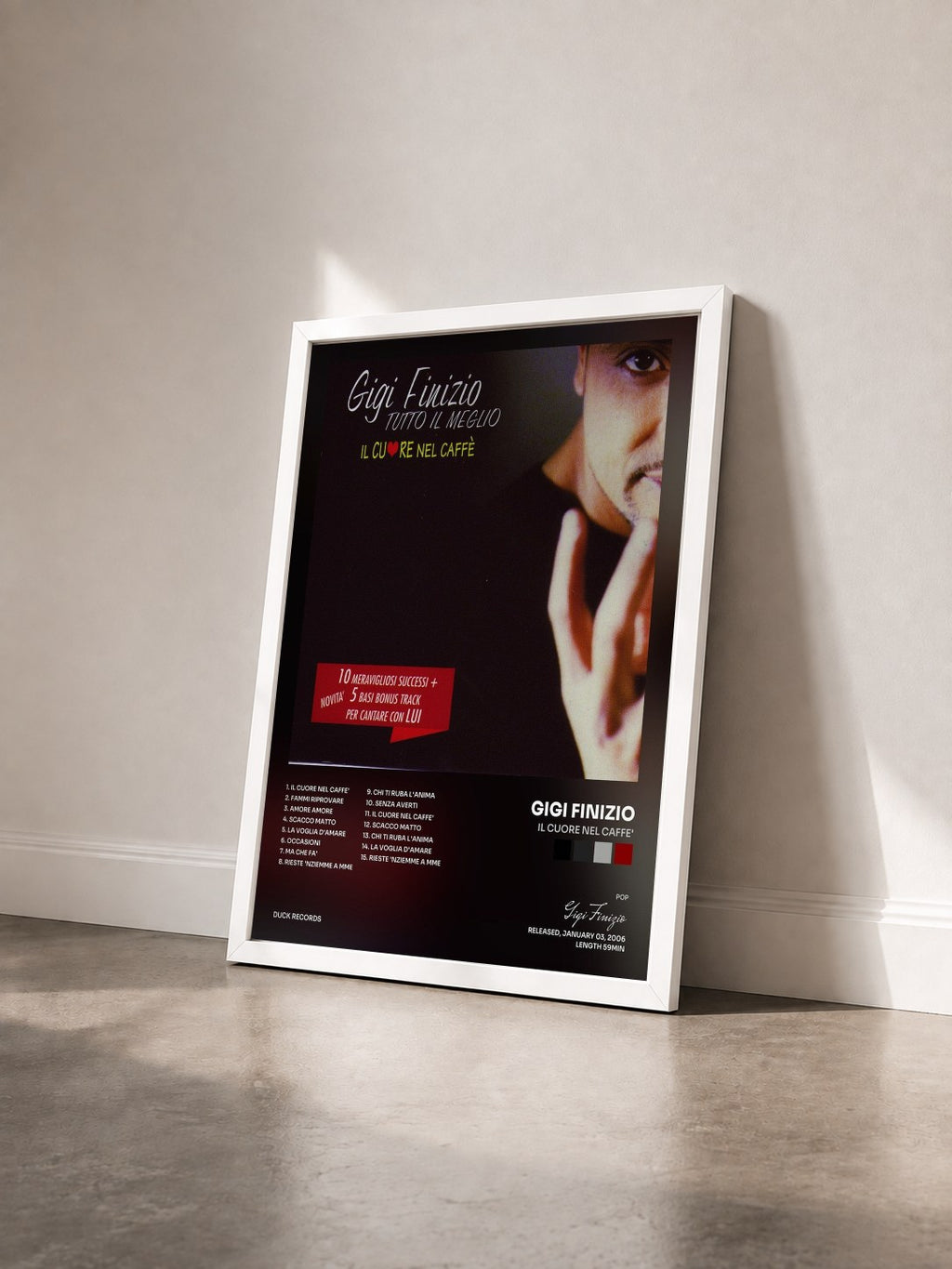 #blanc Tableau de l'album Il Cuore Nel Caffe' de Gigi Finizio vu de trois quarts, cadre blanc