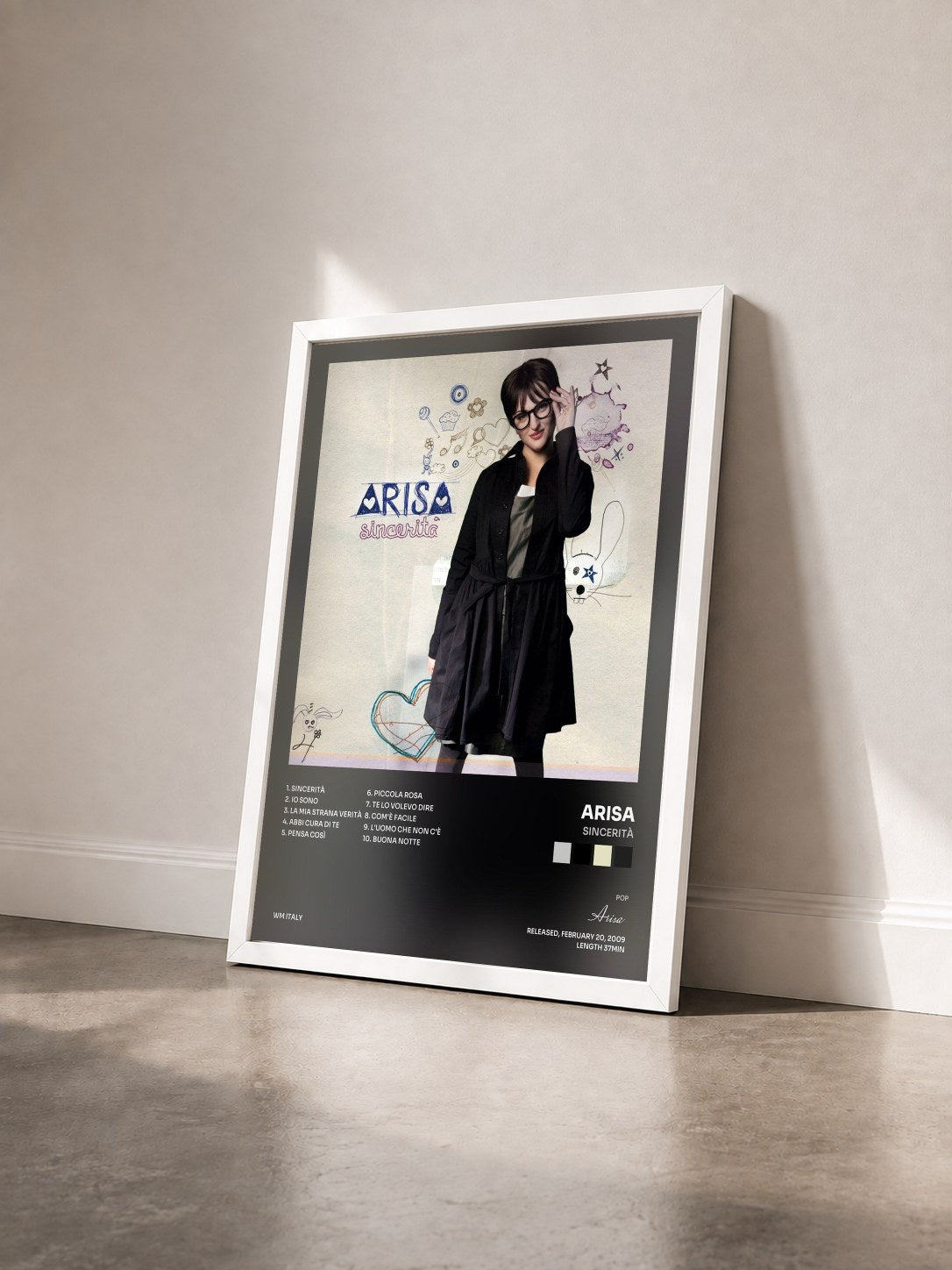 #blanc Tableau de l'album Sincerità de Arisa vu de trois quarts, cadre blanc