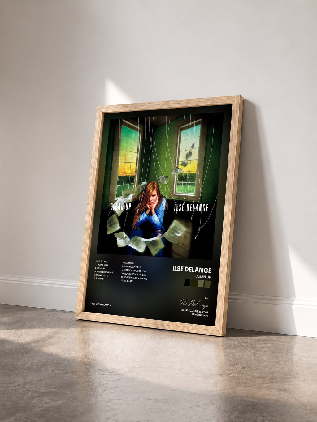 #bois Tableau de l'album Clean Up de Ilse DeLange vu de trois quarts, cadre en bois brut