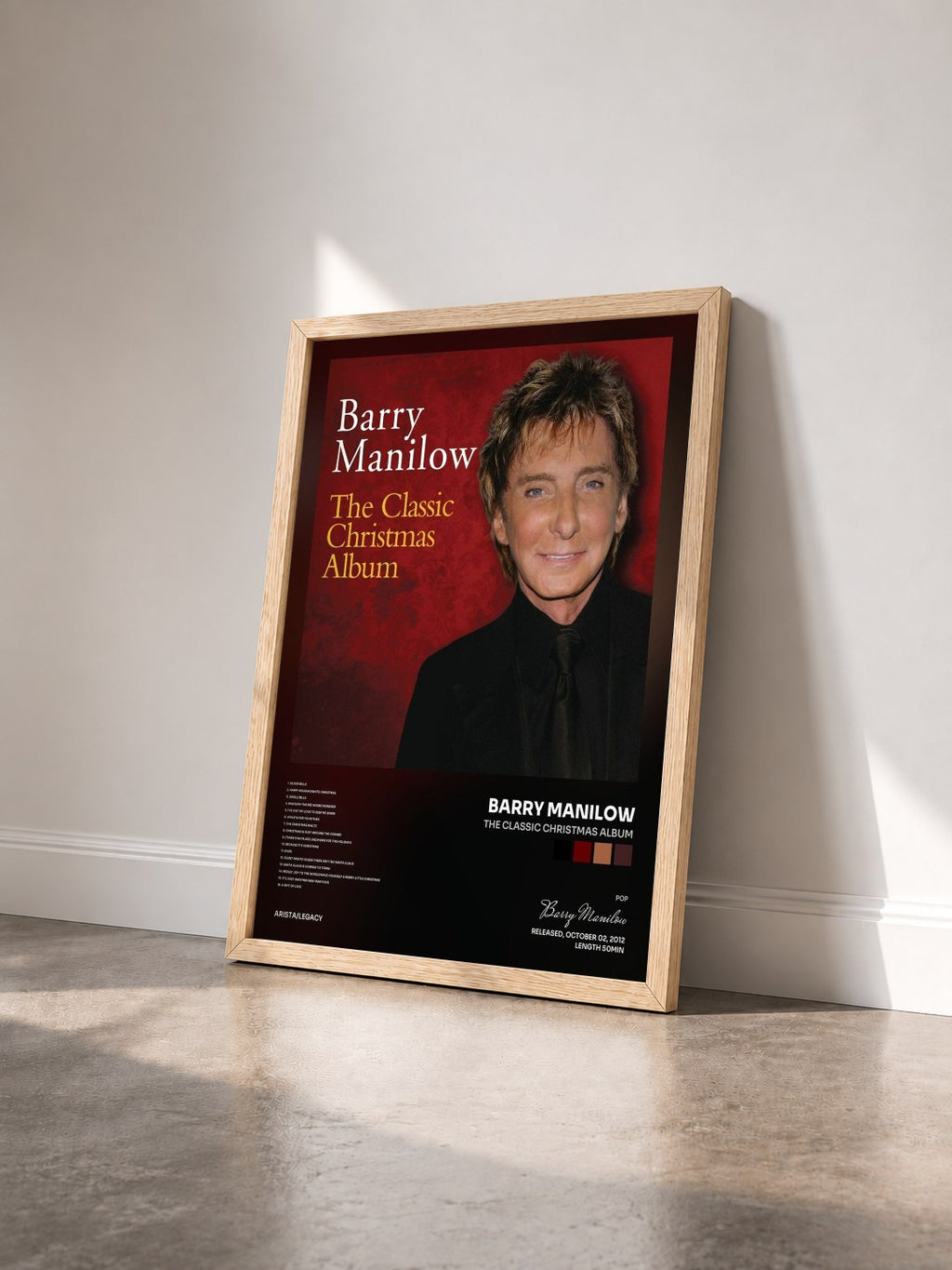 #bois Tableau de l'album The Classic Christmas Album de Barry Manilow vu de trois quarts, cadre en bois brut