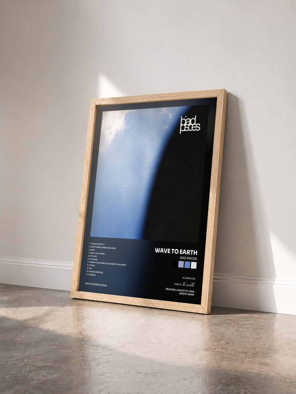 #bois Tableau de l'album bad pieces de wave to earth vu de trois quarts, cadre en bois brut