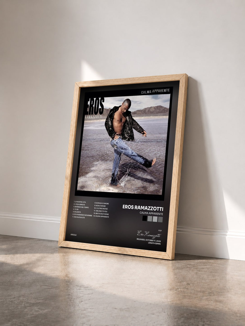 #bois Tableau de l'album Calma Apparente de Eros Ramazzotti vu de trois quarts, cadre en bois brut