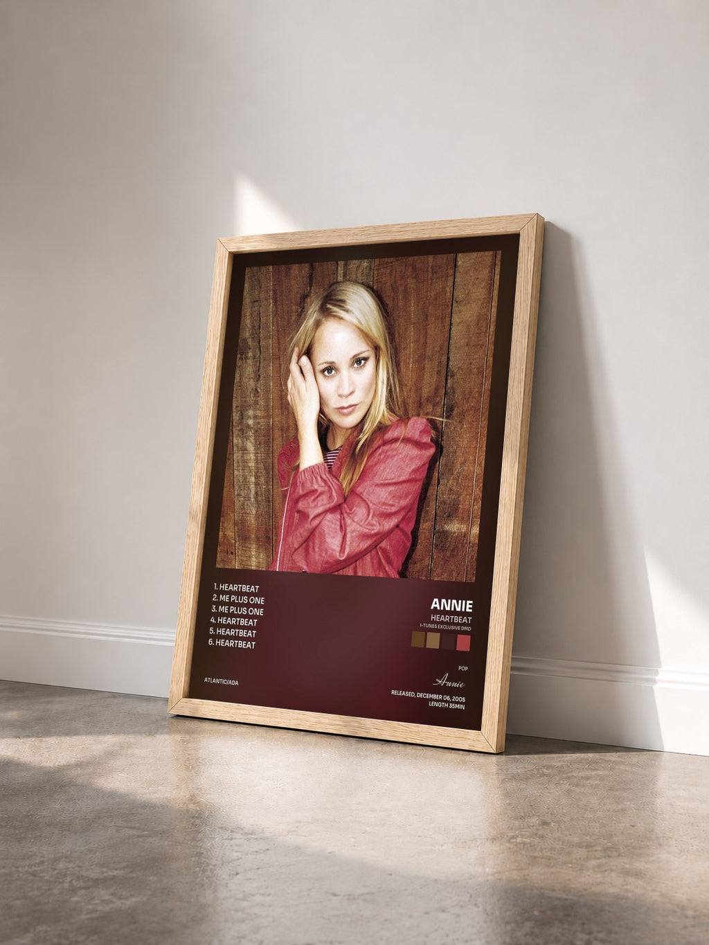 #bois Tableau de l'album Heartbeat (i-Tunes exclusive DMD) de Annie vu de trois quarts, cadre en bois brut