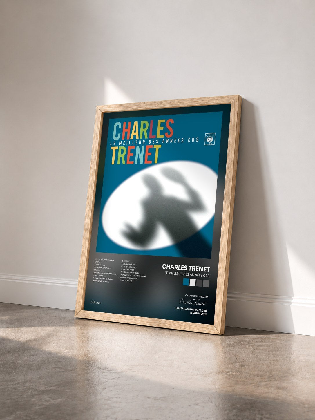 #bois Tableau de l'album Le meilleur des années CBS de Charles Trenet vu de trois quarts, cadre en bois brut