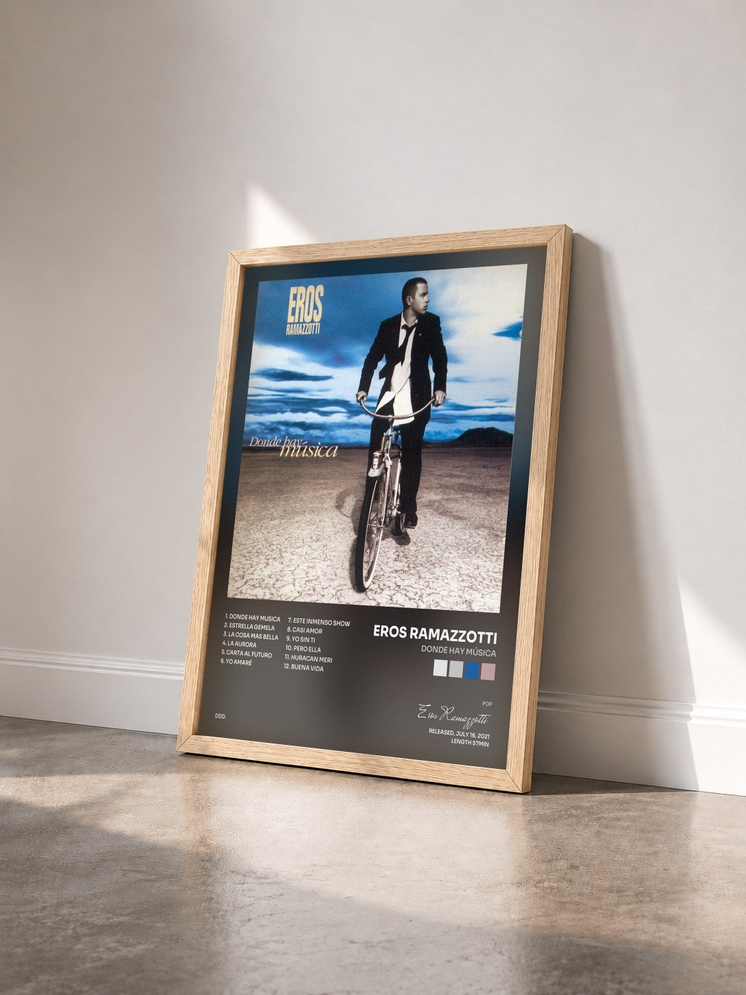 #bois Tableau de l'album Donde Hay Música de Eros Ramazzotti vu de trois quarts, cadre en bois brut