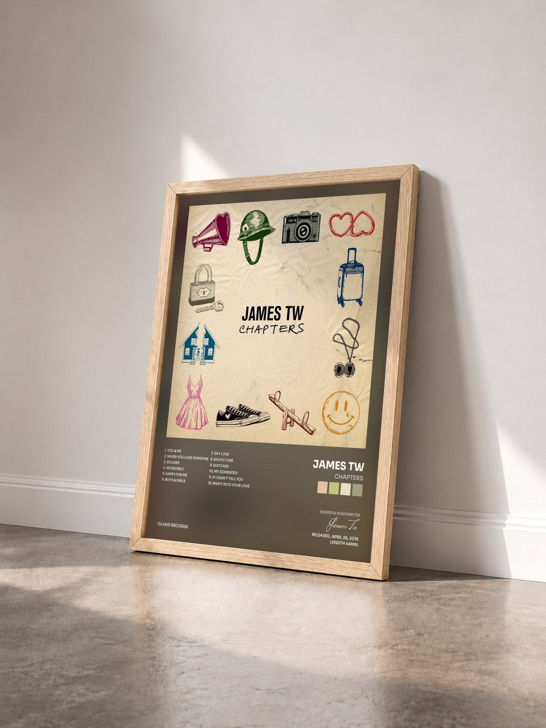 #bois Tableau de l'album Chapters de James Tw vu de trois quarts, cadre en bois brut