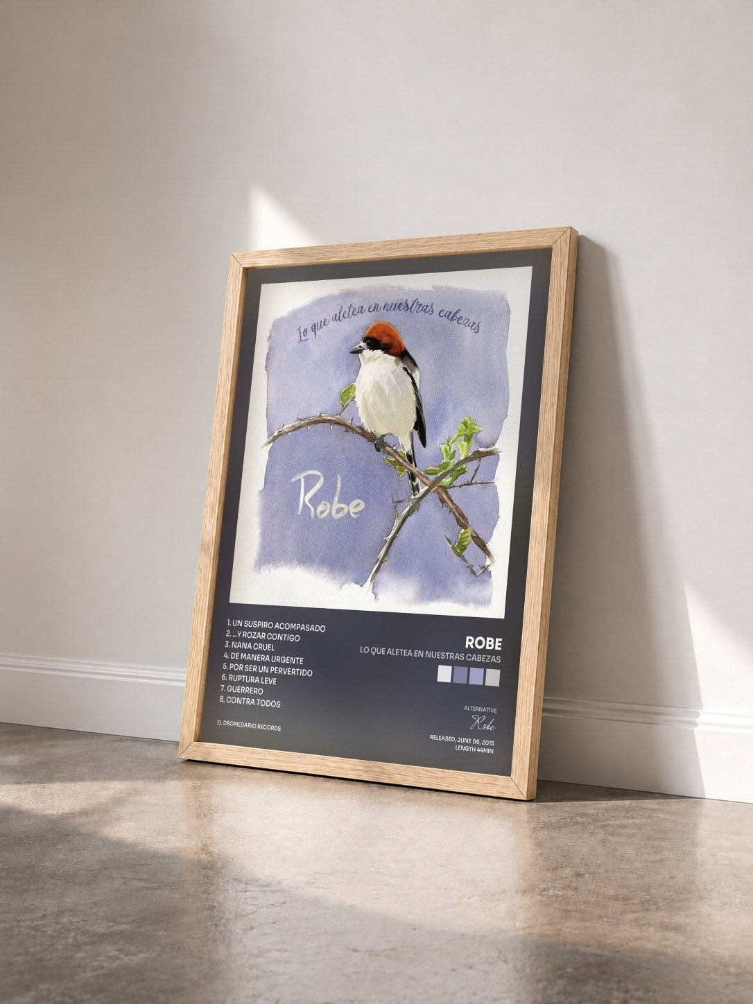 #bois Tableau de l'album Lo Que Aletea en Nuestras Cabezas de Robe vu de trois quarts, cadre en bois brut