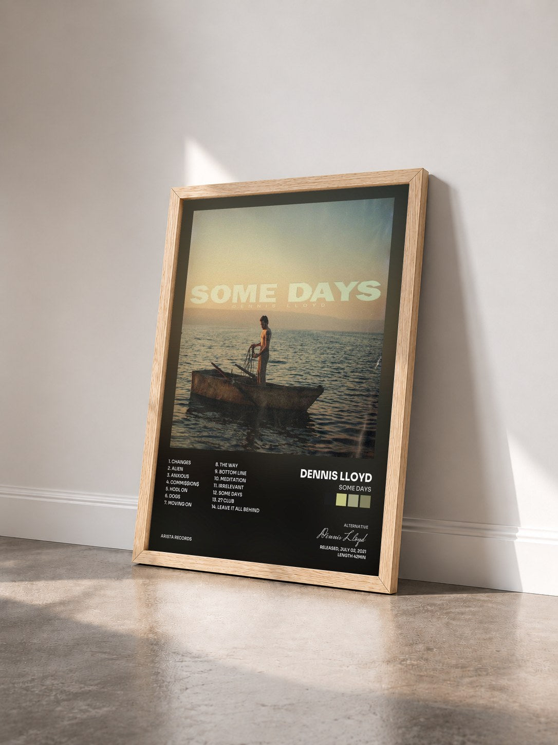 #bois Tableau de l'album Some Days de Dennis Lloyd vu de trois quarts, cadre en bois brut