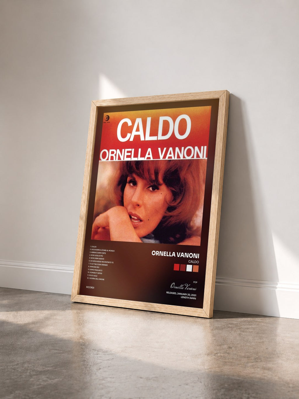 #bois Tableau de l'album Caldo de Ornella Vanoni vu de trois quarts, cadre en bois brut