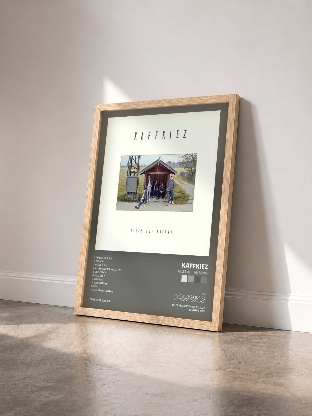 #bois Tableau de l'album Alles Auf Anfang de KAFFKIEZ vu de trois quarts, cadre en bois brut