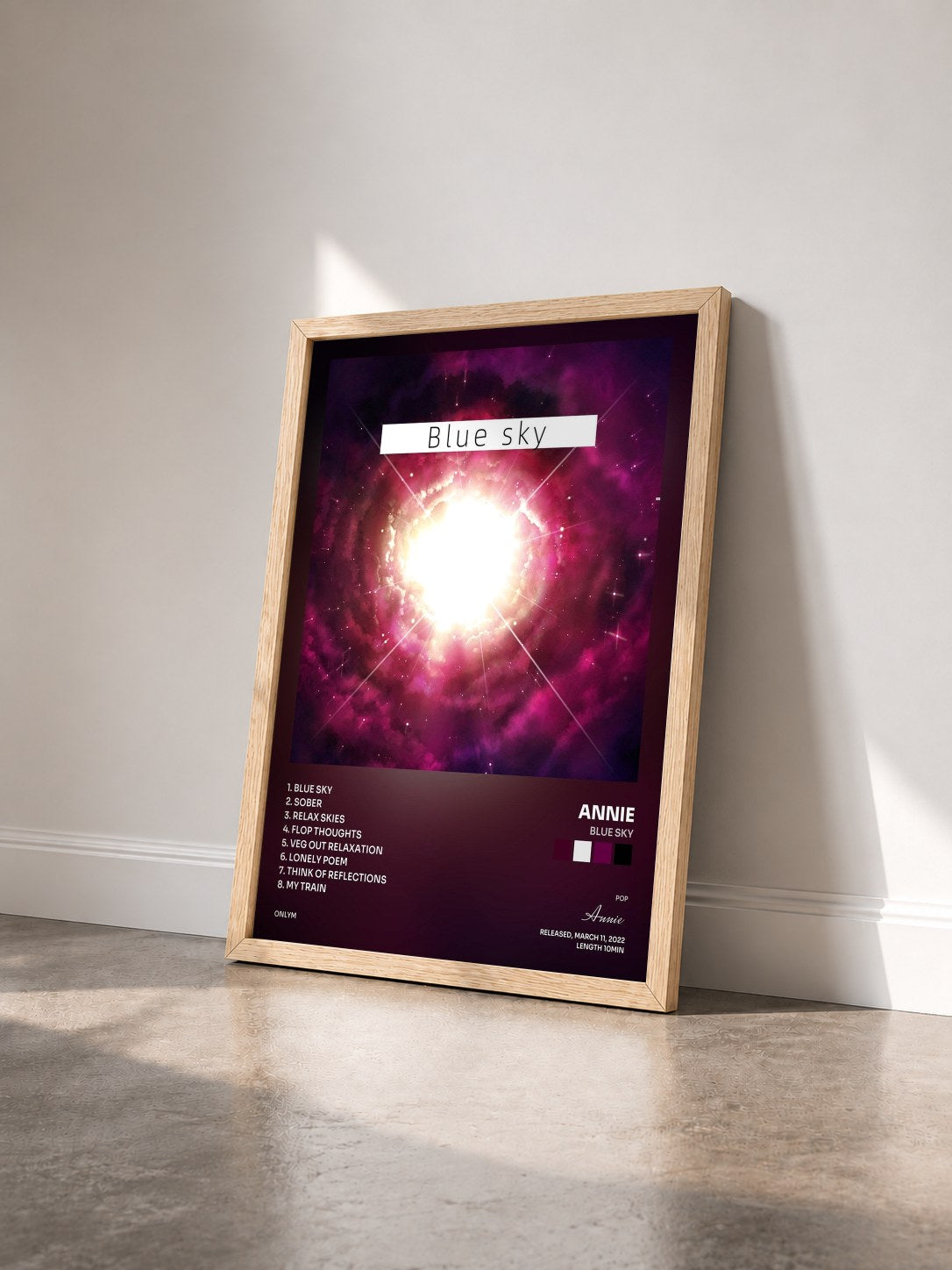 #bois Tableau de l'album Blue sky de Annie vu de trois quarts, cadre en bois brut