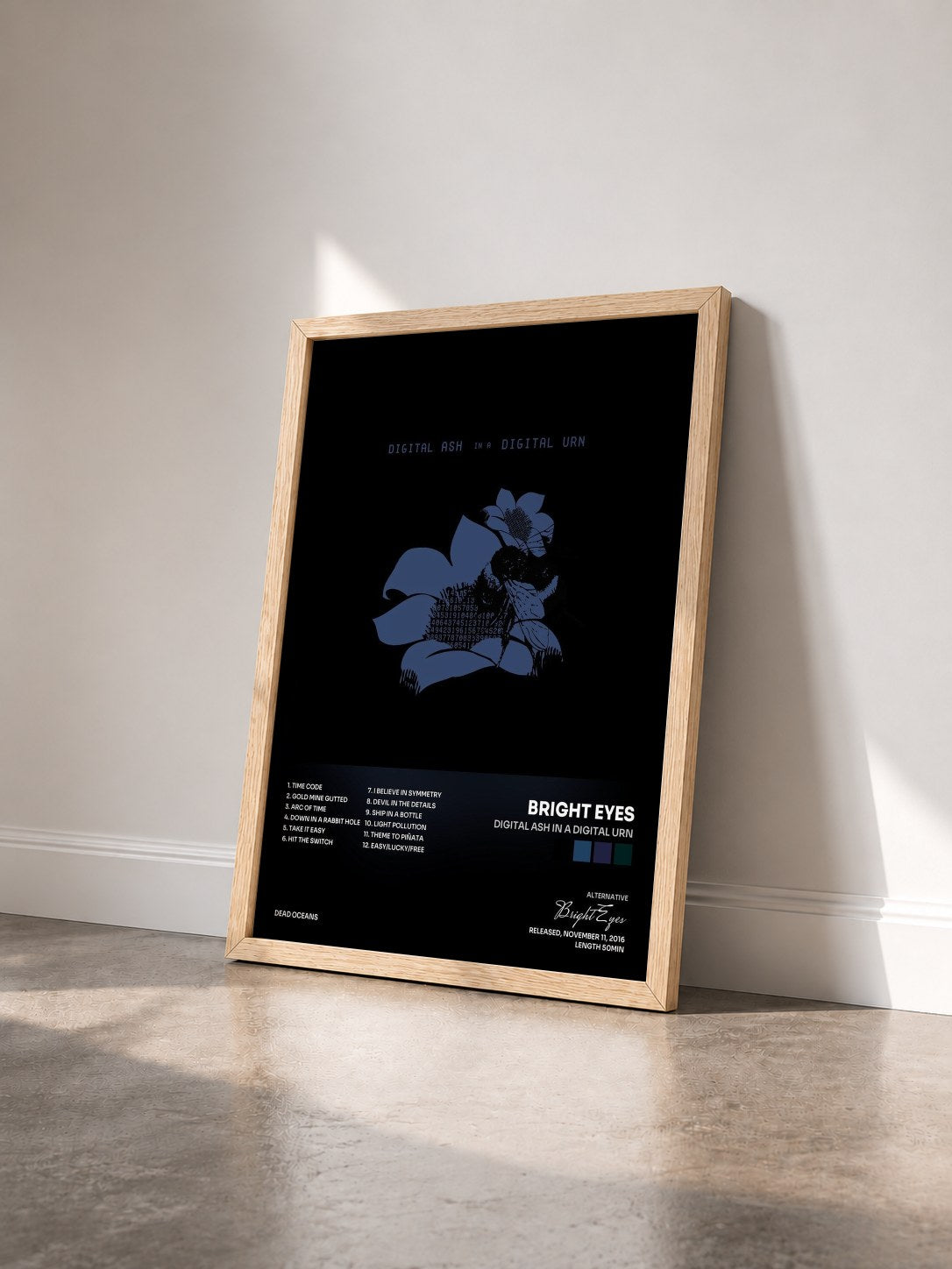 #bois Tableau de l'album Digital Ash in a Digital Urn de Bright Eyes vu de trois quarts, cadre en bois brut