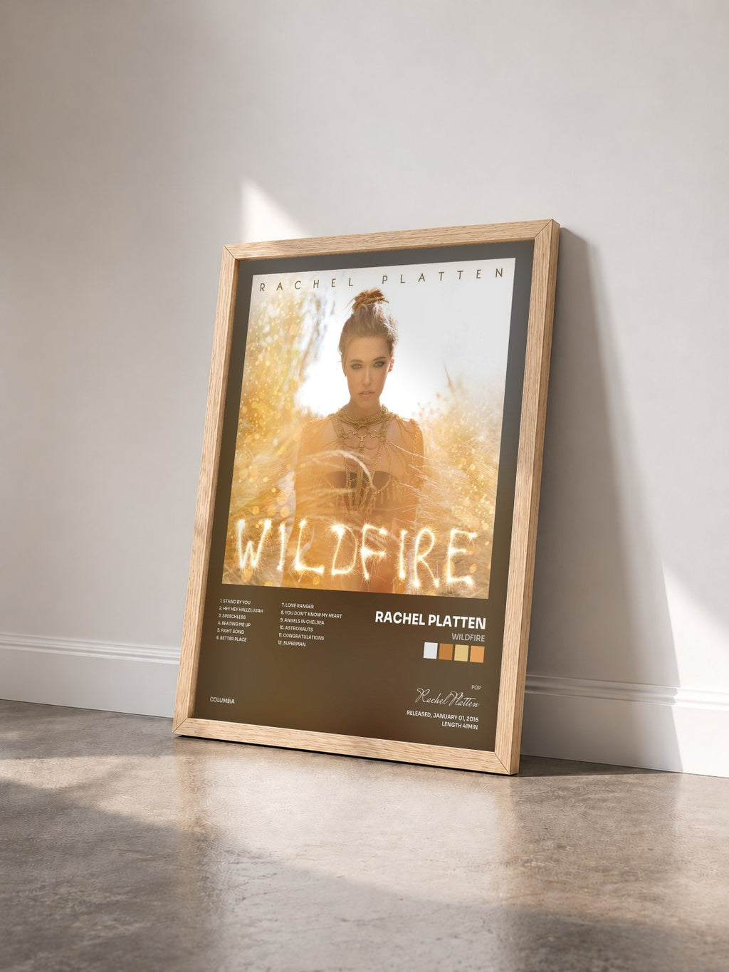 #bois Tableau de l'album Wildfire de Rachel Platten vu de trois quarts, cadre en bois brut