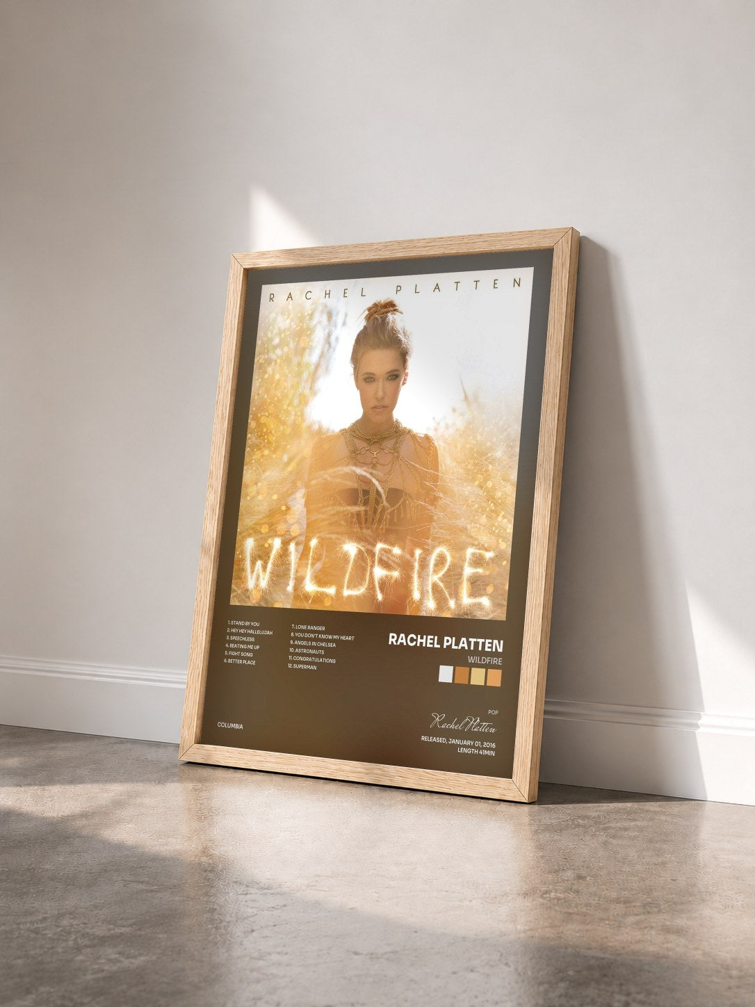 #bois Tableau de l'album Wildfire de Rachel Platten vu de trois quarts, cadre en bois brut