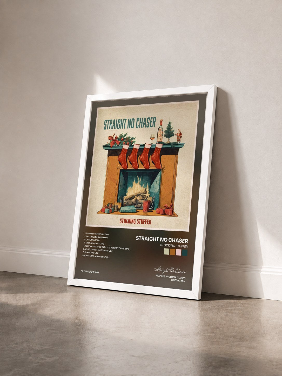 #blanc Tableau de l'album Stocking Stuffer de Straight No Chaser vu de trois quarts, cadre blanc