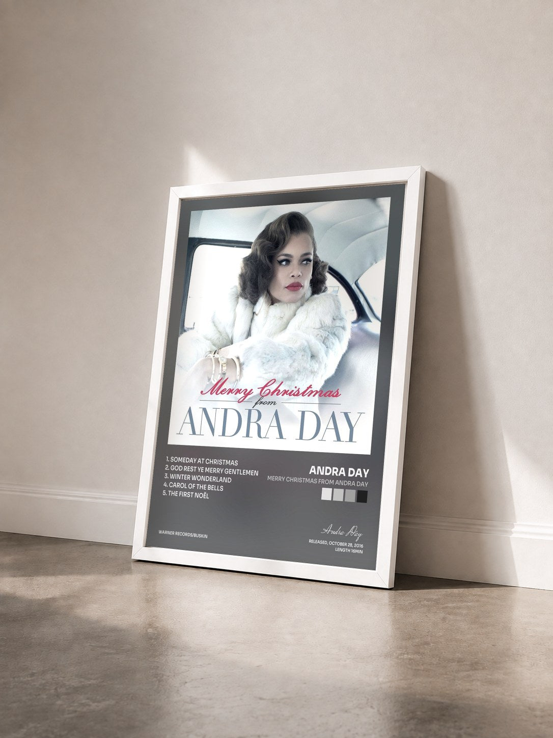 #blanc Tableau de l'album Merry Christmas from Andra Day de Andra Day vu de trois quarts, cadre blanc