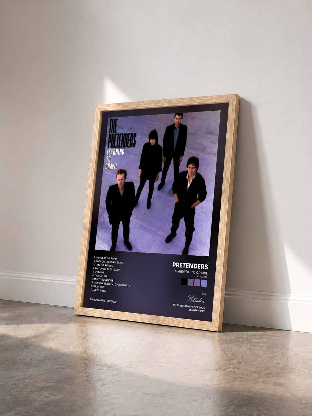#bois Tableau de l'album Learning to Crawl (US Release) de Pretenders vu de trois quarts, cadre en bois brut