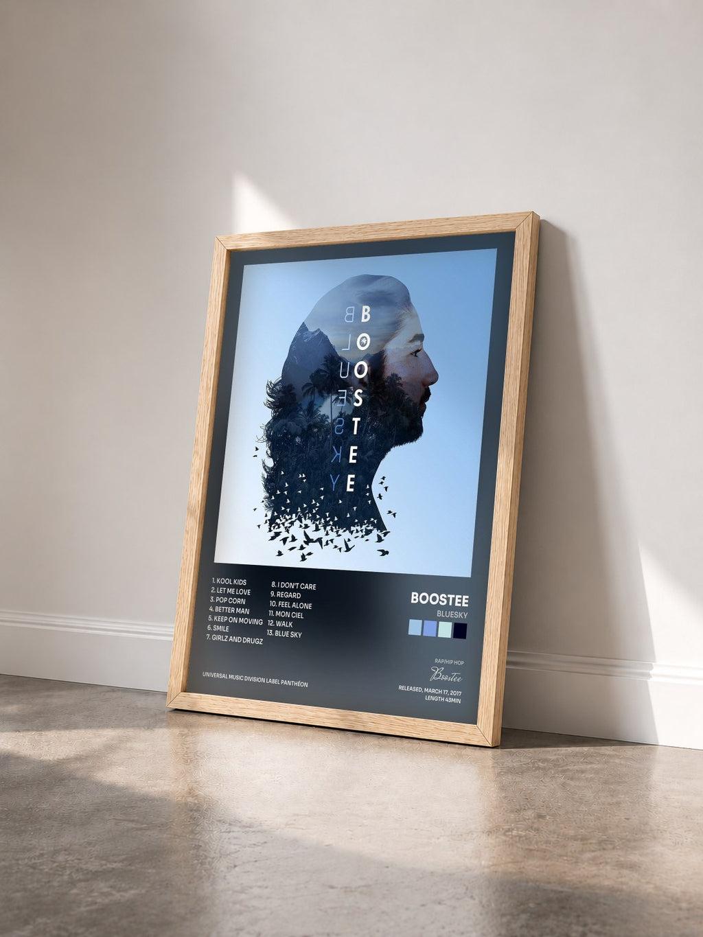 #bois Tableau de l'album Bluesky de Boostee vu de trois quarts, cadre en bois brut