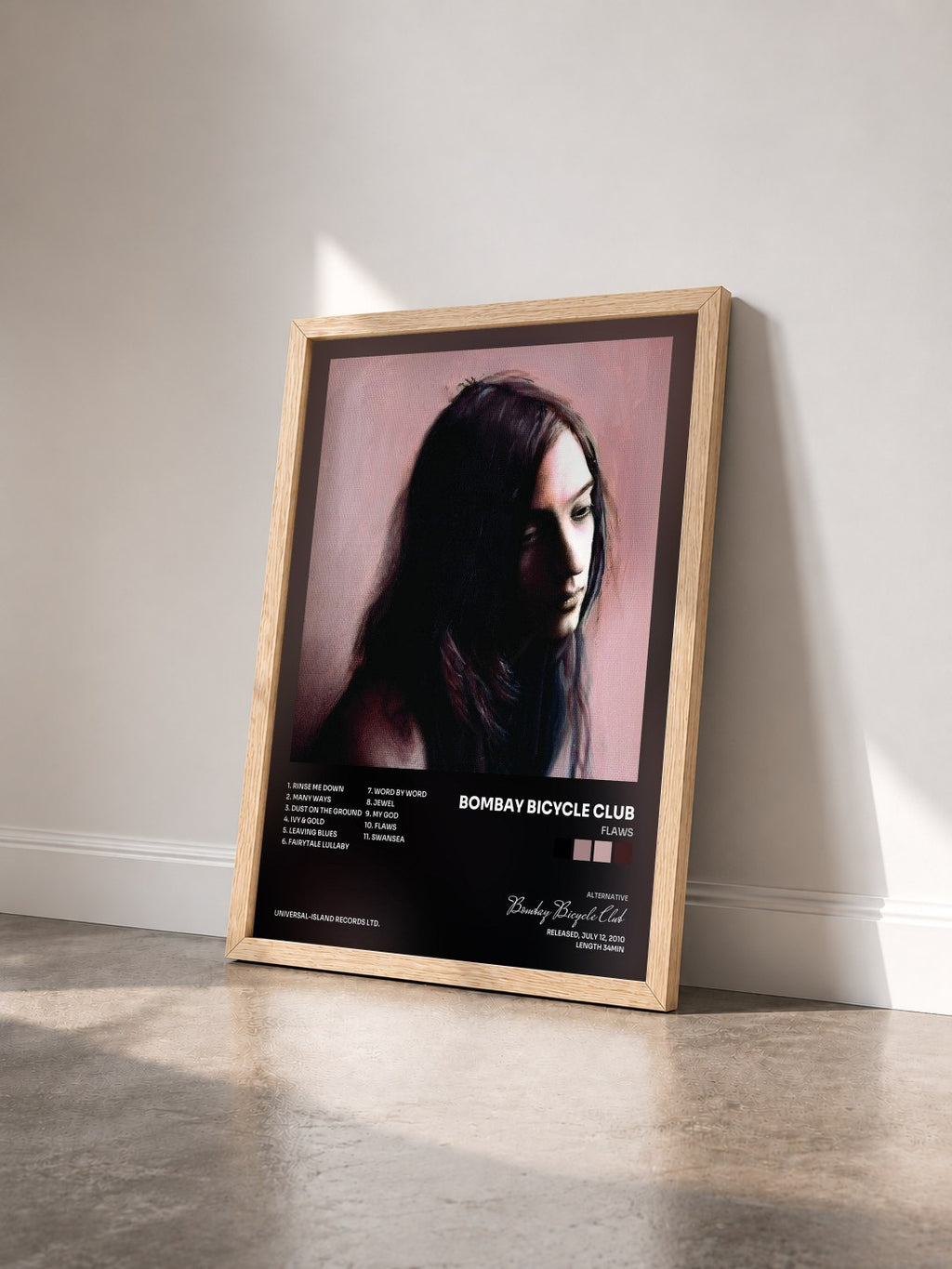 #bois Tableau de l'album Flaws de Bombay Bicycle Club vu de trois quarts, cadre en bois brut