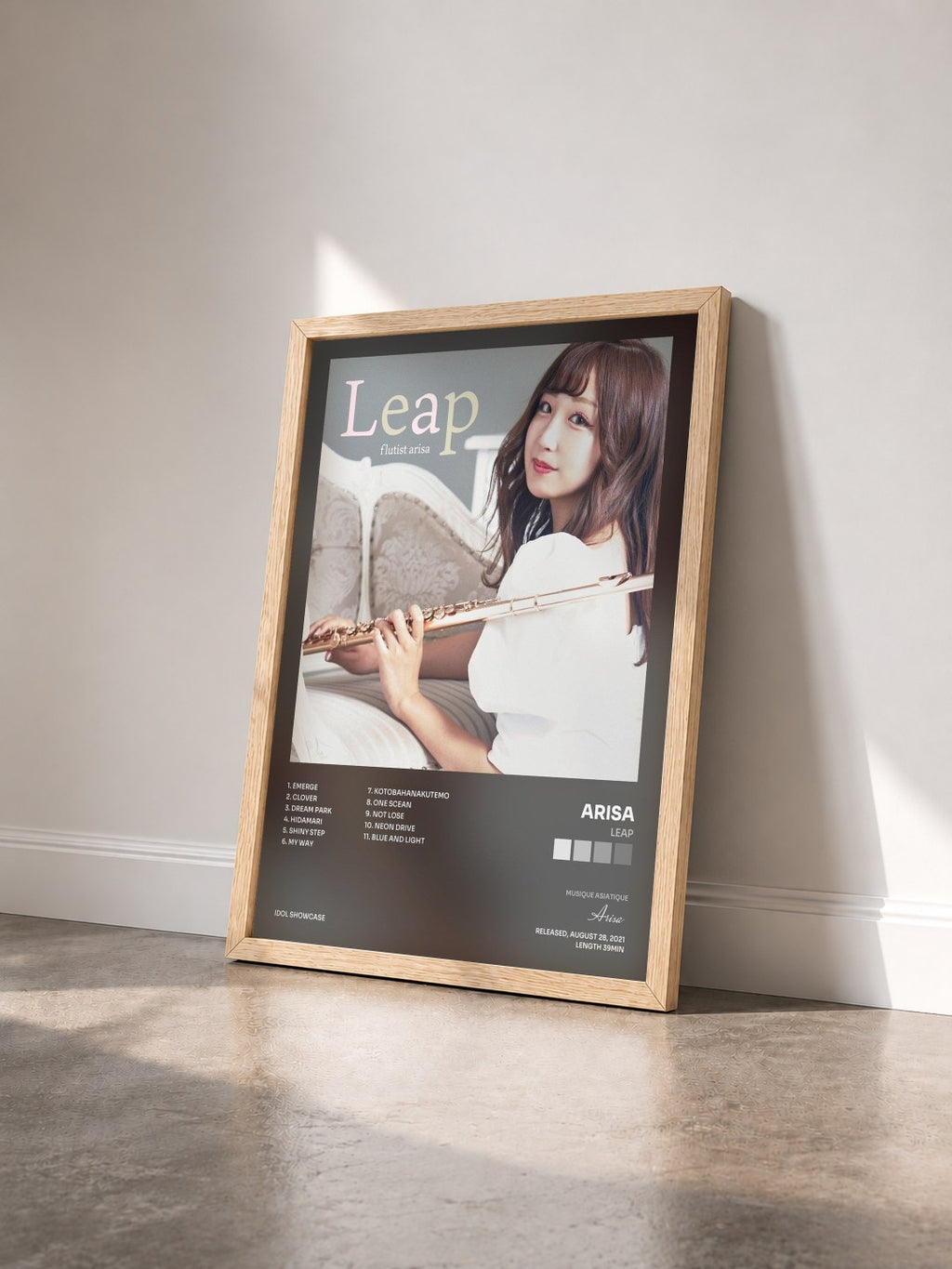 #bois Tableau de l'album Leap de Arisa vu de trois quarts, cadre en bois brut