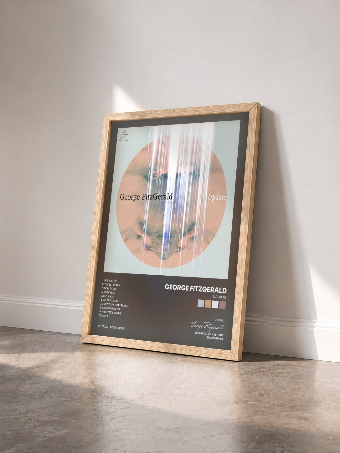 #bois Tableau de l'album Update de George Fitzgerald vu de trois quarts, cadre en bois brut