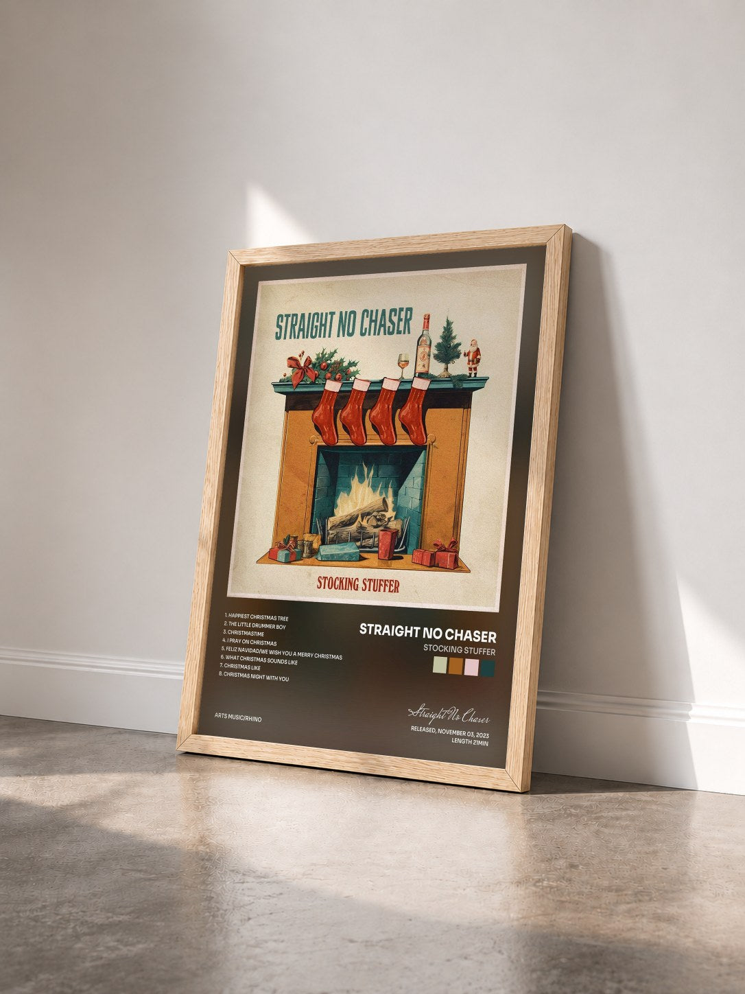 #bois Tableau de l'album Stocking Stuffer de Straight No Chaser vu de trois quarts, cadre en bois brut
