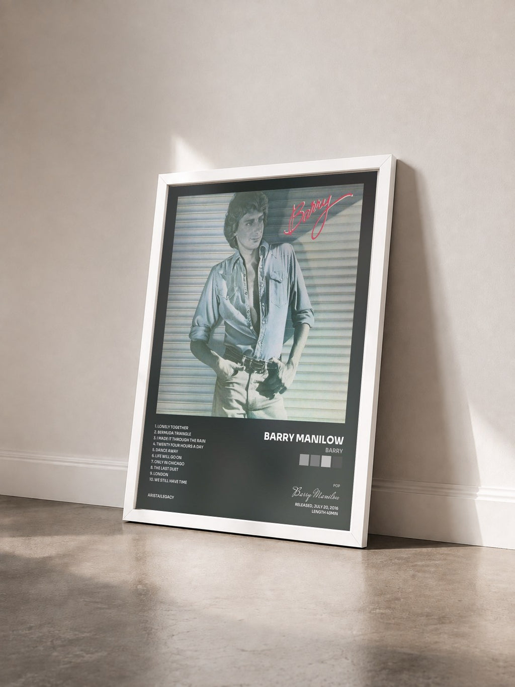 #blanc Tableau de l'album Barry de Barry Manilow vu de trois quarts, cadre blanc