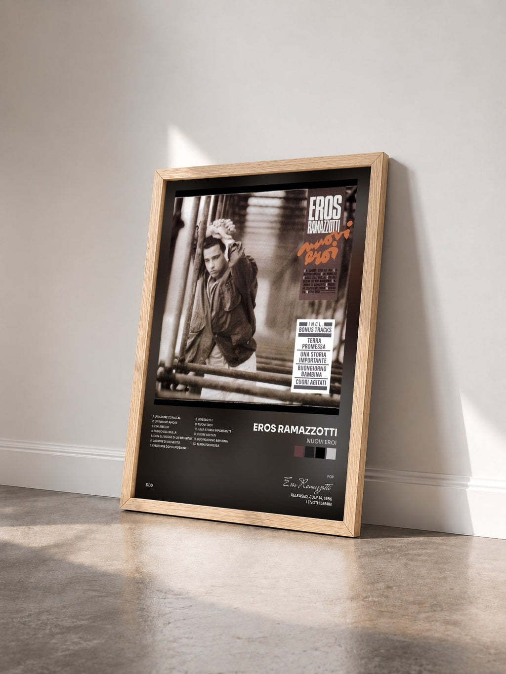 #bois Tableau de l'album Nuovi Eroi de Eros Ramazzotti vu de trois quarts, cadre en bois brut