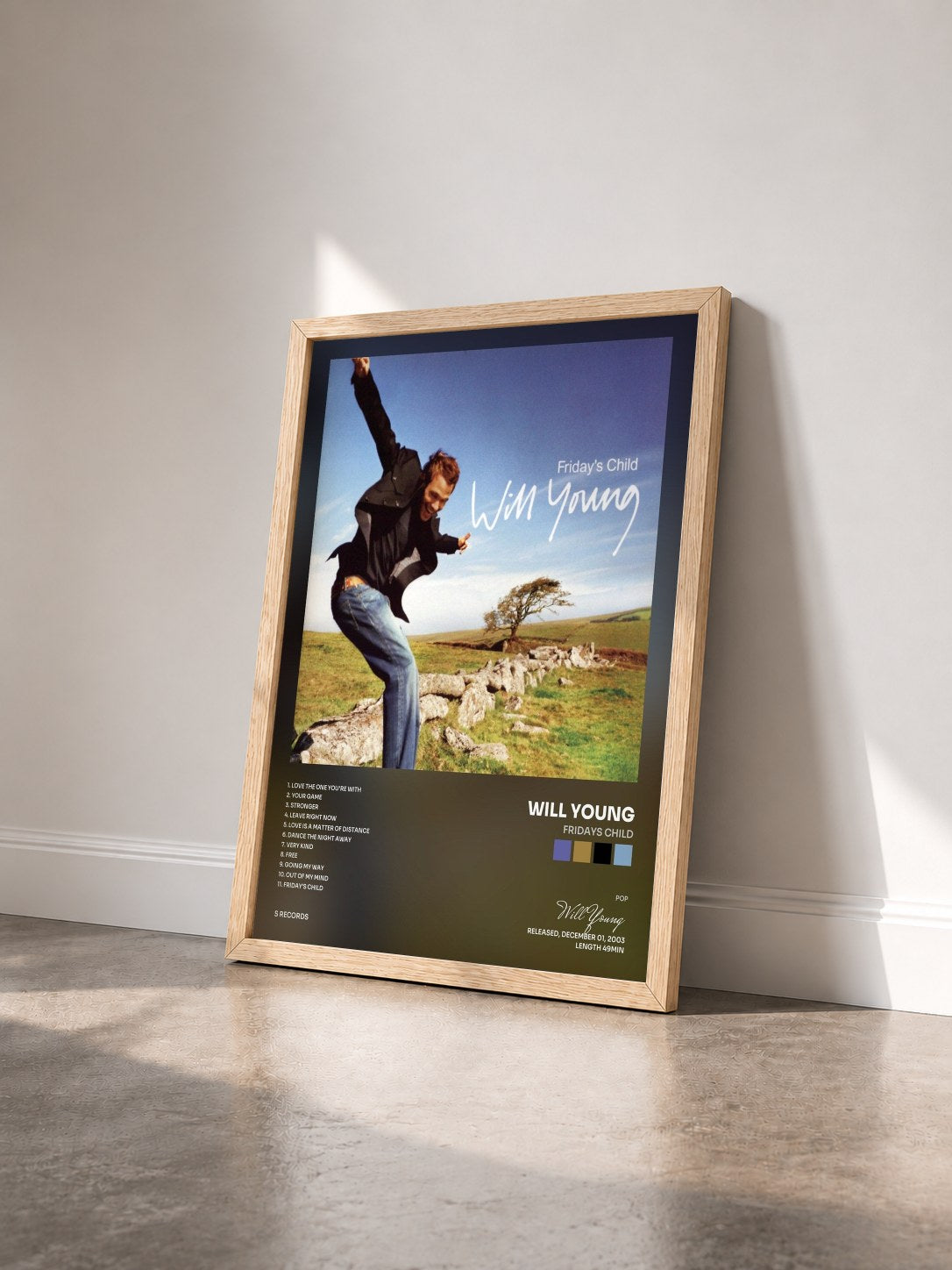 #bois Tableau de l'album Fridays Child de Will Young vu de trois quarts, cadre en bois brut