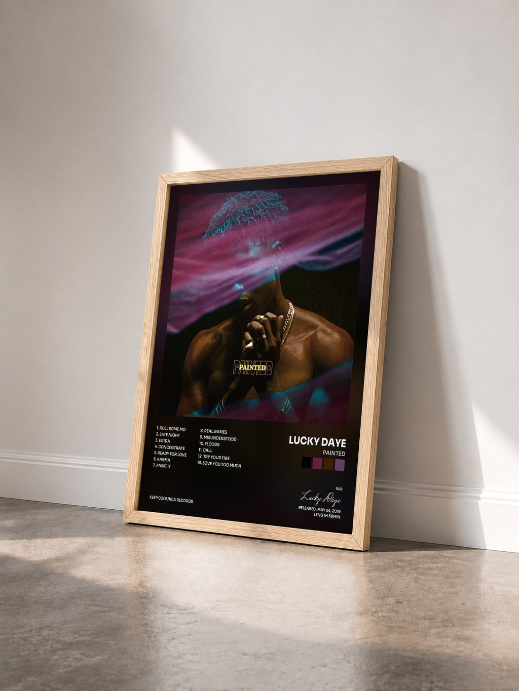 #bois Tableau de l'album Painted de Lucky Daye vu de trois quarts, cadre en bois brut