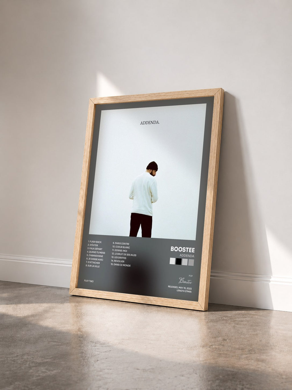 #bois Tableau de l'album Addenda de Boostee vu de trois quarts, cadre en bois brut
