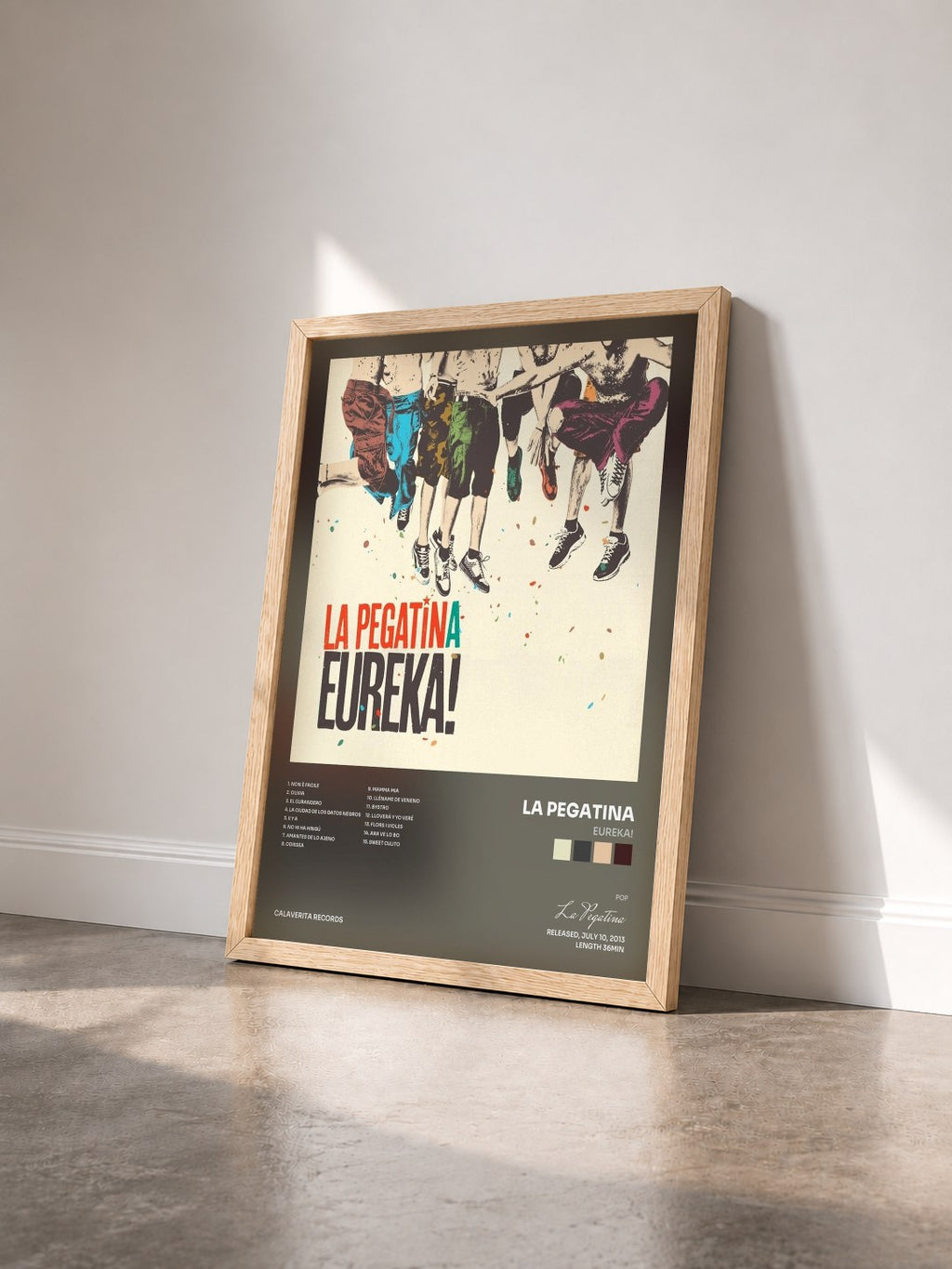 #bois Tableau de l'album Eureka! de La Pegatina vu de trois quarts, cadre en bois brut