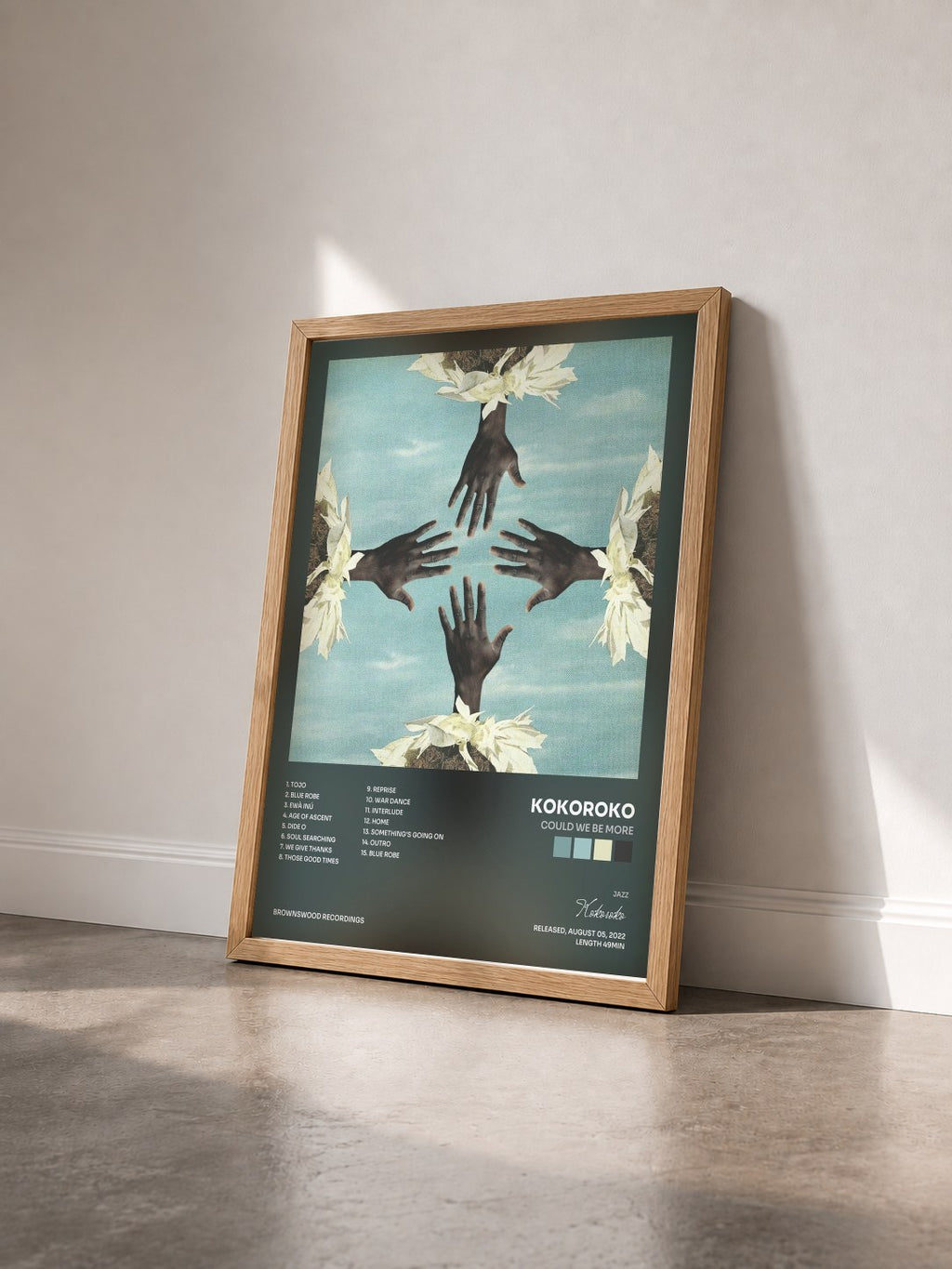 #bois Tableau de l'album Could We Be More de Kokoroko vu de trois quarts, cadre en bois brut