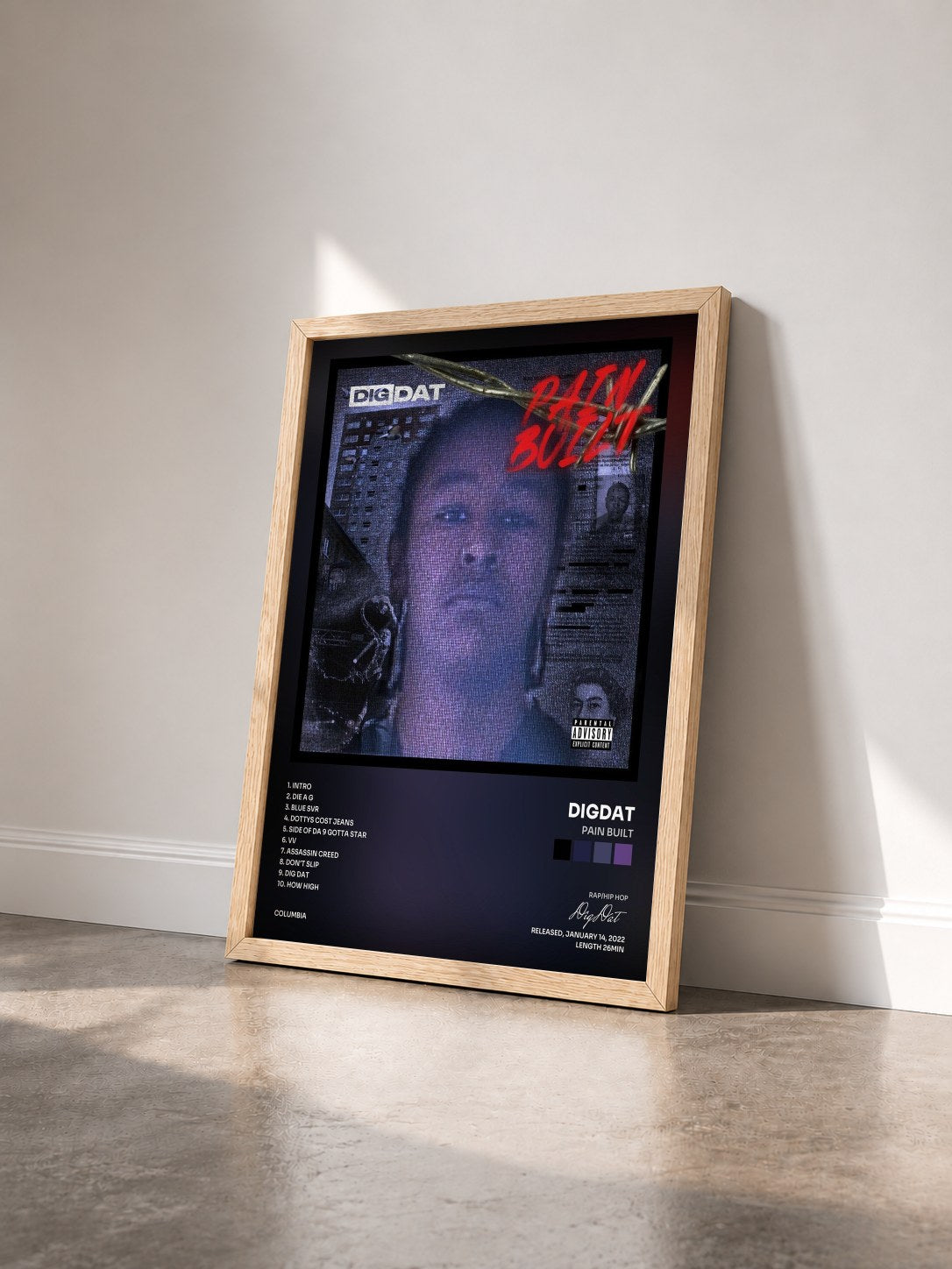 #bois Tableau de l'album Pain Built de DigDat vu de trois quarts, cadre en bois brut