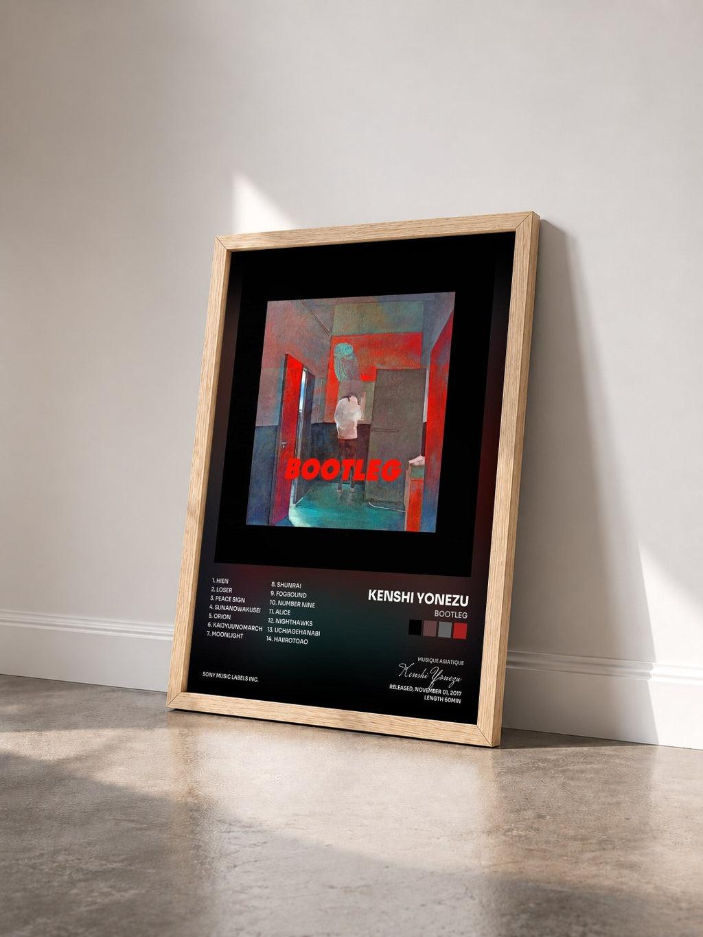 #bois Tableau de l'album BOOTLEG de Kenshi Yonezu vu de trois quarts, cadre en bois brut