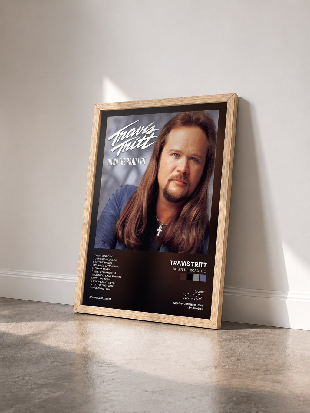 #bois Tableau de l'album Down The Road I Go de Travis Tritt vu de trois quarts, cadre en bois brut