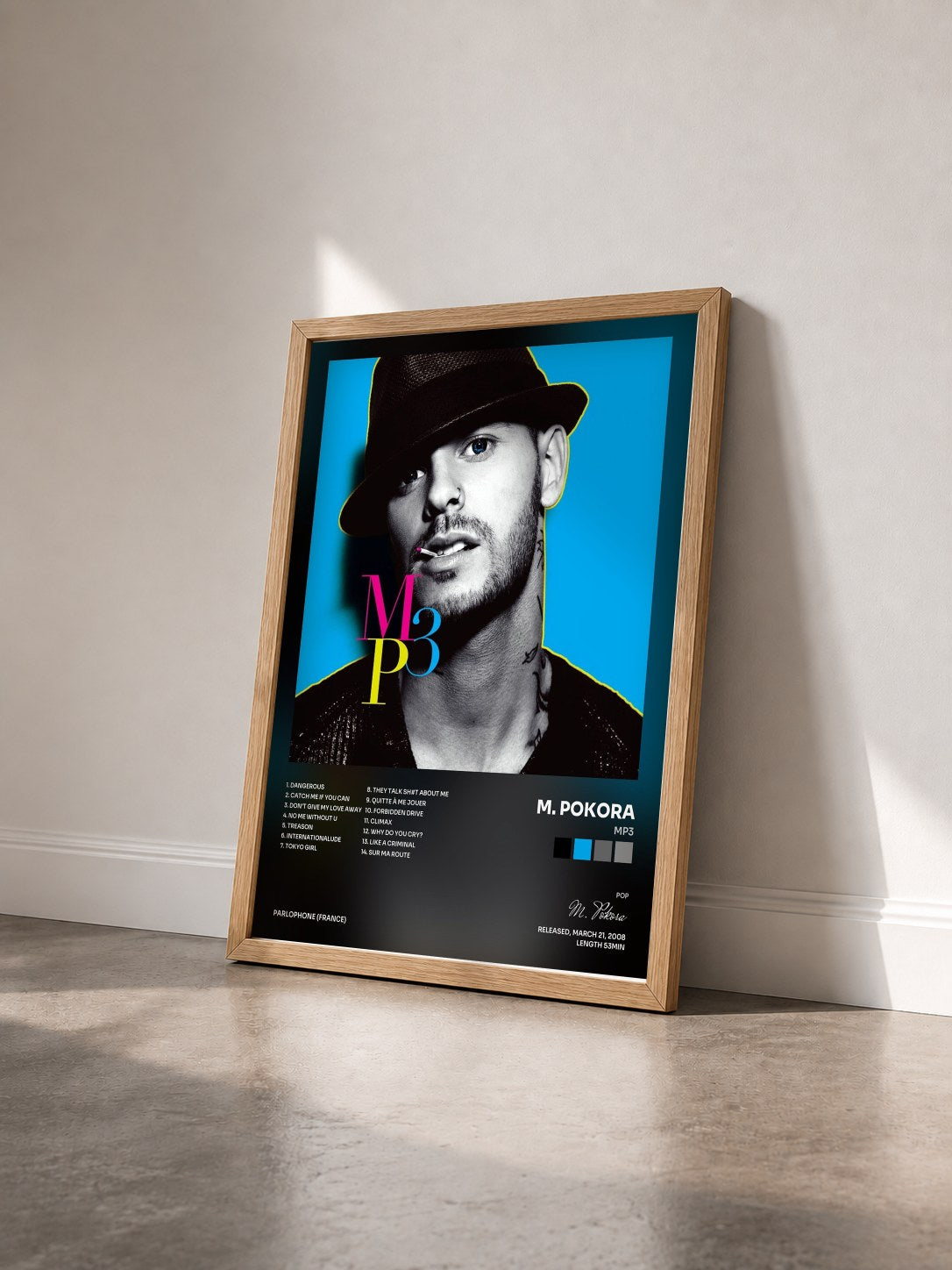 #bois Tableau de l'album Mp3 de M. Pokora vu de trois quarts, cadre en bois brut