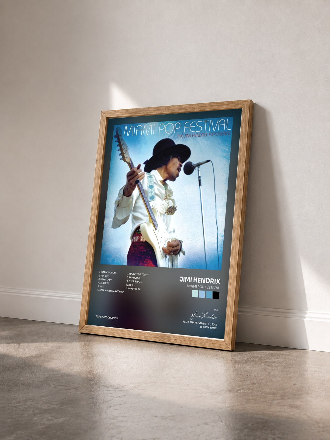 #bois Tableau de l'album Miami Pop Festival de Jimi Hendrix vu de trois quarts, cadre en bois brut
